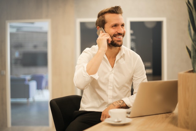 property-manager-on-phone-smiling