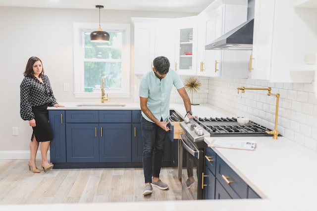 landlord-inspecting-rental-property-kitchen